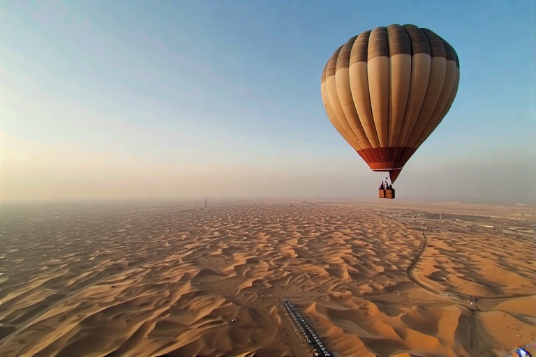 Hot air balloon flying over Dubai desert
